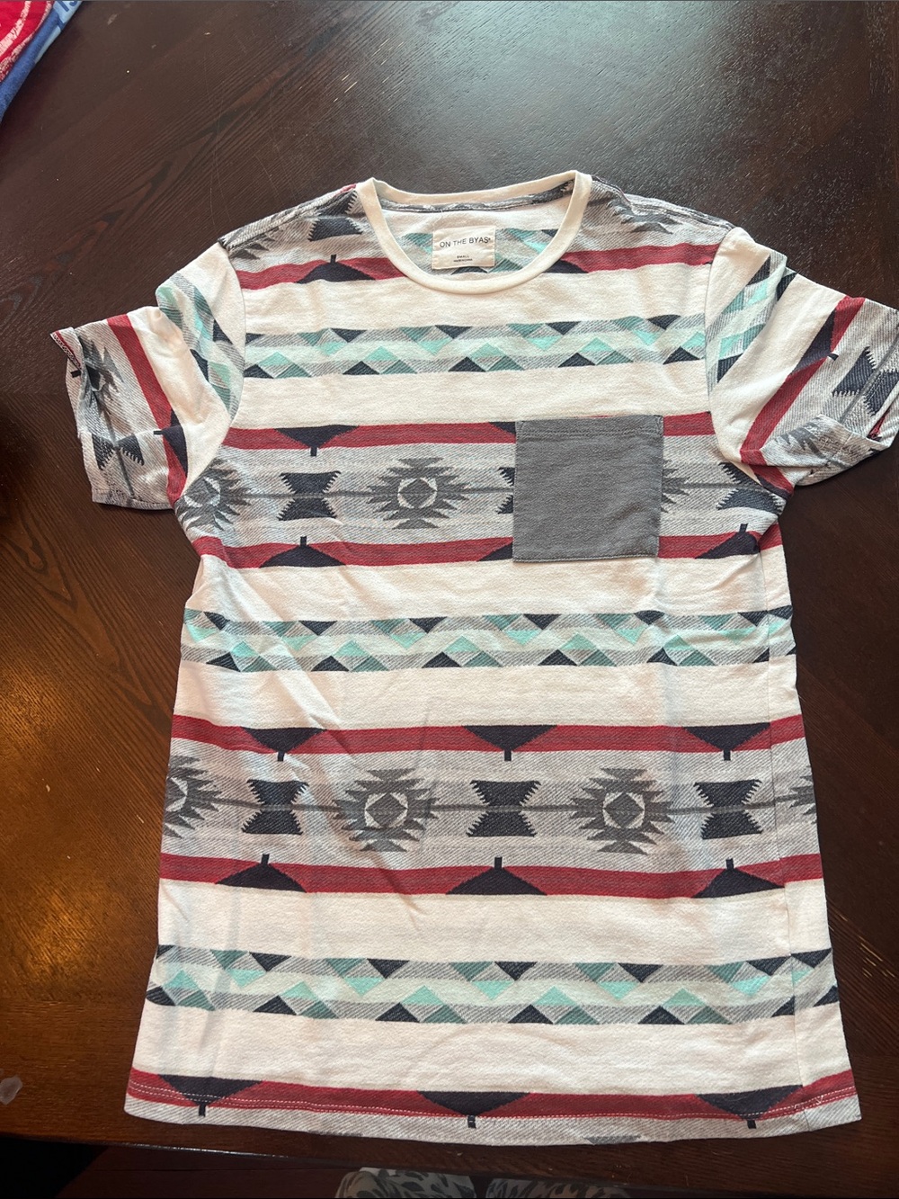 on the byas Men's Short-Sleeve Aztec Stripe Tee in White, Red & Gray